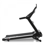 Aside view angle of the Sole S77 treadmill in a raised position