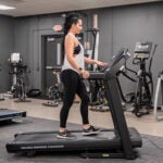 Jessica Using Horizon T101 Treadmill